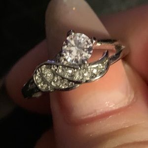 SS angel wing ring with white topaz stones